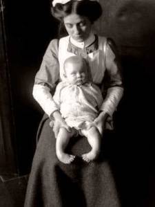 Nurse holding a child with rickets at the Sick Childrens Hospital, Aberdeen